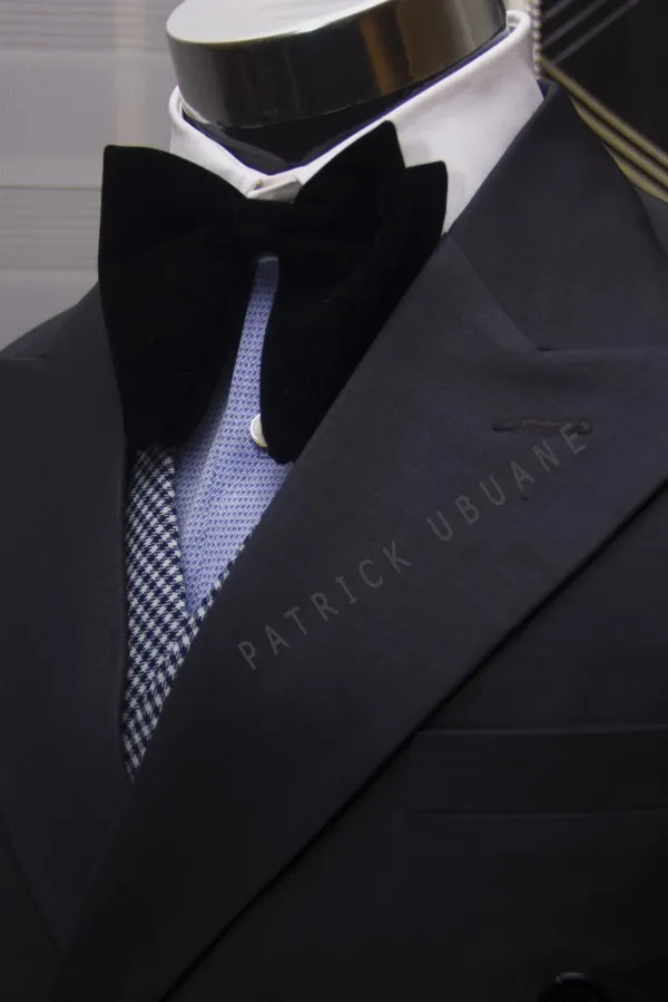 PATRICK UBUANE Clothing logo